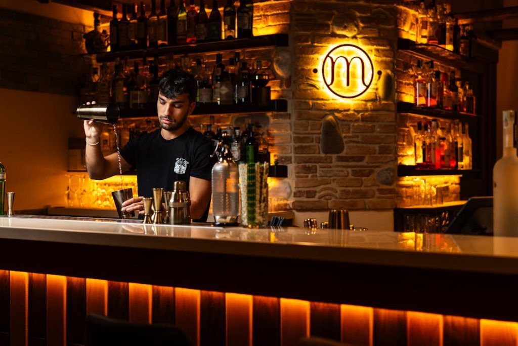 Cocktail bar nightlife using N2O cream chargers for drinks