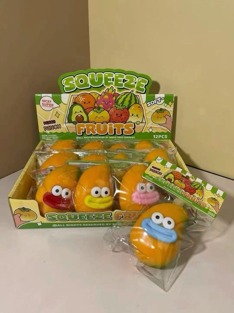 Wholesale Squishy & Fidget Toys | Bulk Squishies, Mochi & Stress Keyboards 5 Wholesale fruit and vegetable squeeze toys in a countertop display box