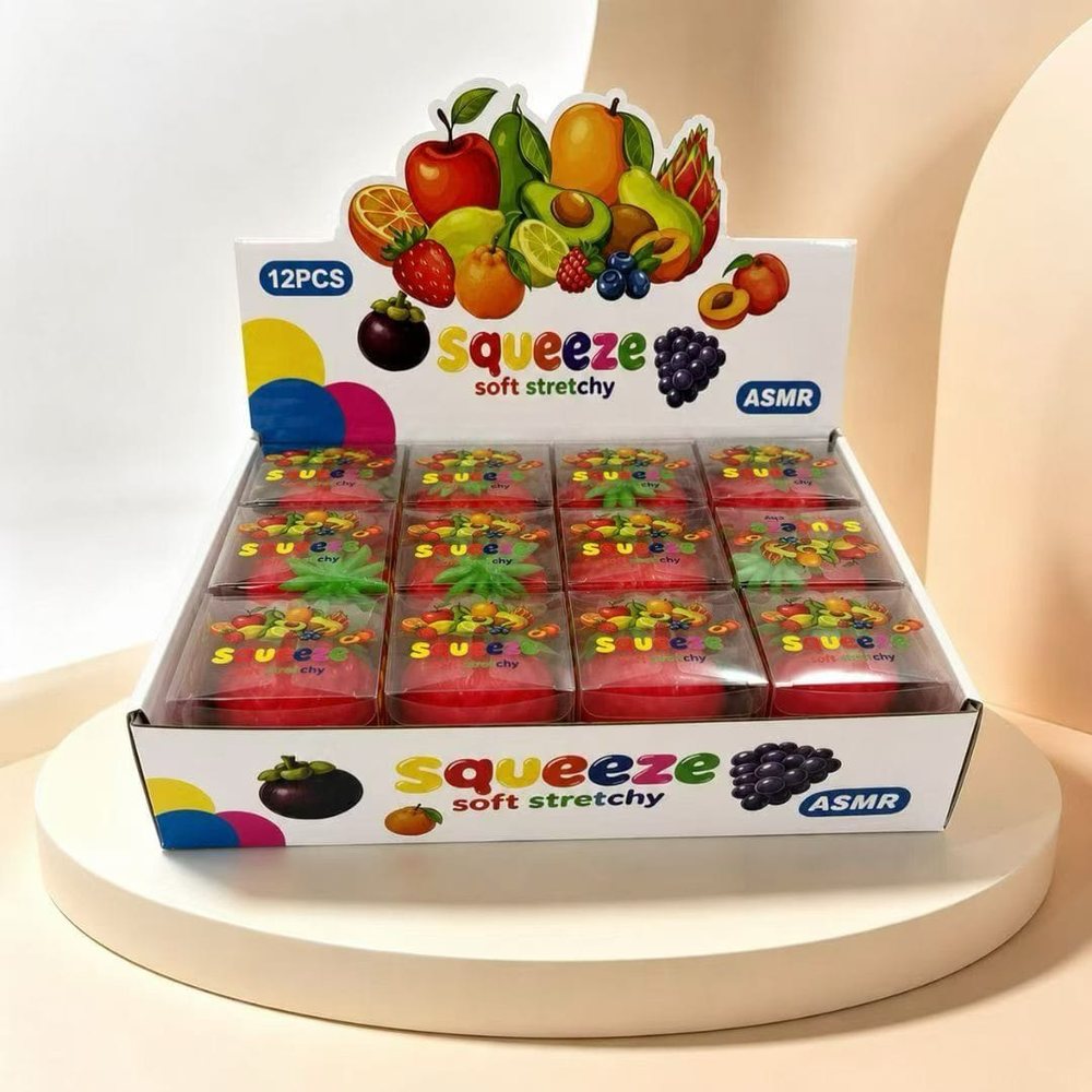Wholesale Squishy & Fidget Toys | Bulk Squishies, Mochi & Stress Keyboards 10 Wholesale gummy and candy style fruit squishies in a display box